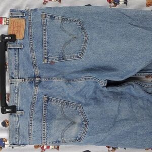 Levi's 550 relaxed fit med light wash straight leg baggy legs denim jeans 42/30